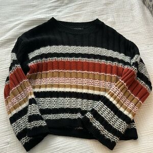 Black striped sweater with bell sleeves